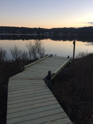 Raised boardwalk overlooking lake